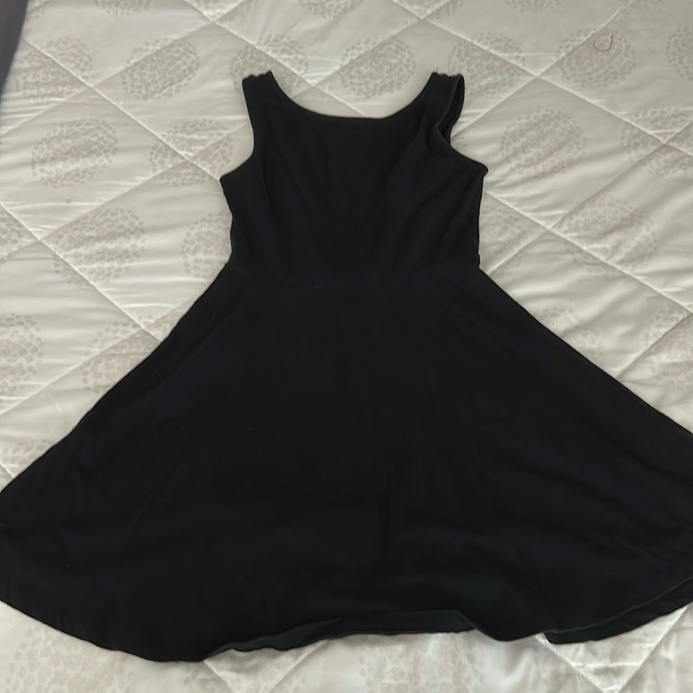 Black backless dress with a bow